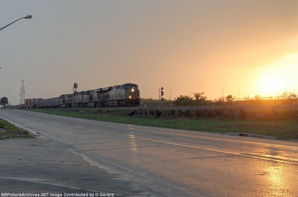 Q188 moving in heavy rain in the setting sun